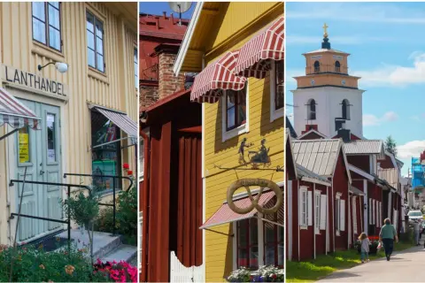 En mysig stad i Sverige med en gammal lanthandel, gula och röda hus samt en kyrka.