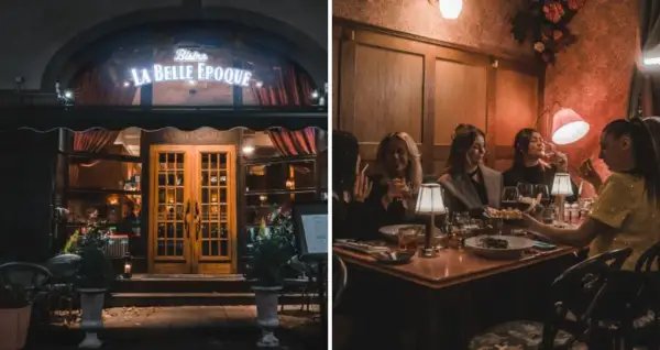 Kvällsbild på Bistro La Belle Epoque med gäster som njuter av middag.